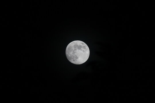 full moon over black sky
