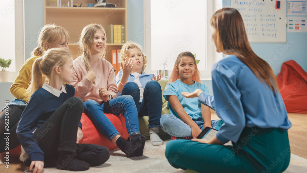 Poster school creativity class: children sitting on the bean bags while caring teacher explains lesson whil