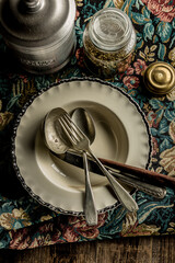 old cutlery on flowery cloth