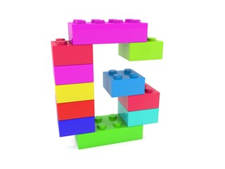 The letter G is composed of toy bricks of different colors on white