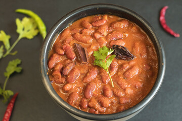 Rājma or Razma is a popular vegetarian dish, originating from the Indian subcontinent, consisting of red kidney beans in a thick gravy