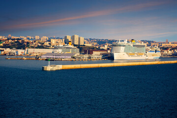 Marseille, France, cruise port. Lighthouse.
 Marseille is the largest port in the Mediterranean on the Gulf of Lyon. The city is located on the coastal hills. A lighthouse is installed on the approach