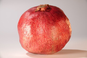 pomegranate fruit on a gray background