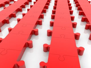 Obraz premium Red pieces of a puzzle arranged in rows on a white background