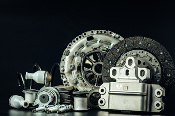 Close up of new car parts on black background