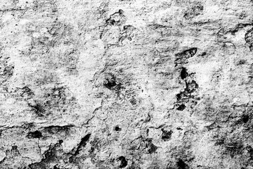 Texture of a concrete wall with cracks and scratches which can be used as a background