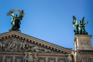 closeup different sculptures adorn front of national opera and ballet theatre in Lviv
