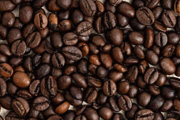 Background of roasted coffee beans, top view