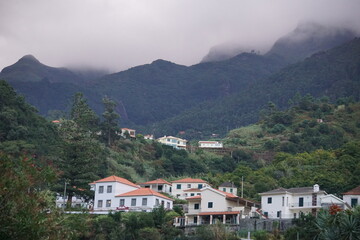 Fototapeta na wymiar Clouds over Sao Vicente town on Madeira