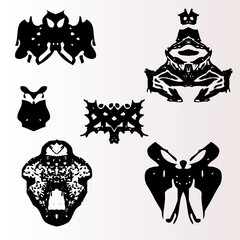 Vector illustration of rorschach monster figures. Black and white spooky symmetry creatures.