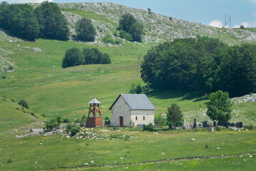 Old church and cemetery below Durmitor mountain
