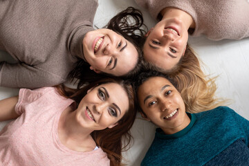 Girls having fun at home, laughing. happy smiling pretty girls having fun