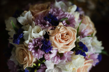 bouquet with wedding rings, the bride's bouquet, wedding rings
