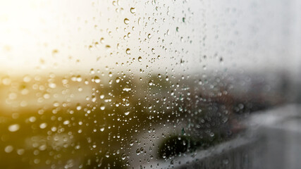 gray wet background / raindrops to overlay on the window, weather, background drops of water rain on the glass transparent