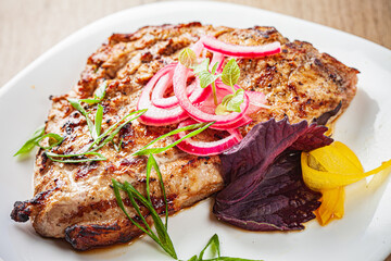 steak with herbs and vegetables