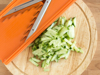 Straw cucumber. Fresh vegetable. Fast vegetable cutter