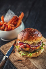 american hamburger with glass of beer in american restaurant or pub, product photography for restaurant in american style