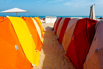 beach umbrellas and huts on the beach of De Panne, Belgium