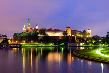 Wawel castle in Krakow at Vistula river at night, Poland