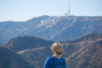 young man in sunglasses in Hollywood hills