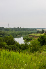 Beautiful nature, river, green forest and blue sky