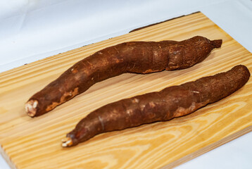 food, brown, vegetable, cassava, tapioca, tropical, roots, maniok, natural, manihot esculenta, raw, organic, whole, yuka, ingredient, peel, cassave, basket, healthy eating, texture, yuca, health, vege