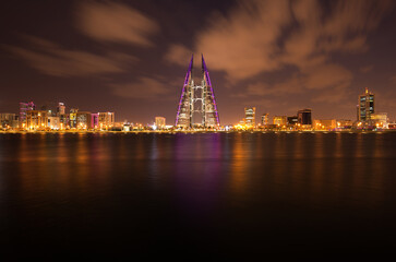 Fototapeta na wymiar MANAMA, BAHRAIN - OCTOBER 28: The Bahrain World Trade Center during dusk, a twin tower complex is the first skyscraper in the world to have wind turbines, October 28, 2018, Manama, Bahrain