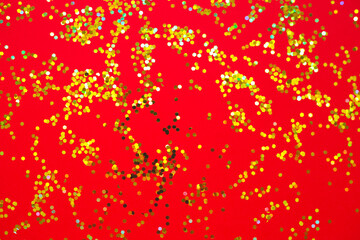 yellow and red sparkles on a red background