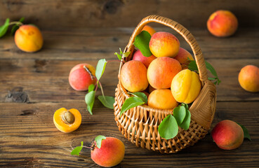Fototapeta na wymiar Fresh organic apricots on the wooden table