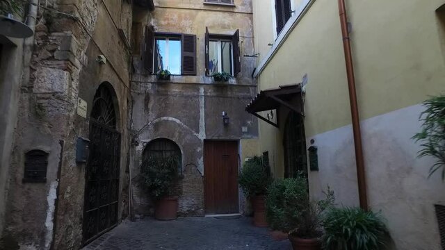 Italy and Rome streets. Apartments and alleys. An enchanting atmosphere.
