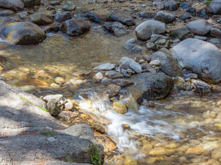 Stream with a small waterfall between the rocks