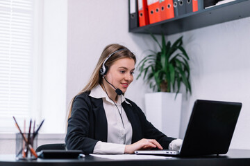 Focused female professional helpline call center agent operator