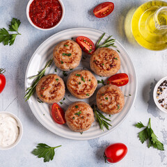 Fresh chiken cutlets with tomatoes and rosemary