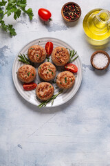 Fresh chiken cutlets with tomatoes and rosemary