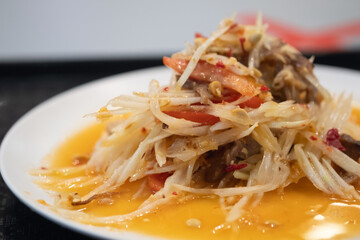 Papaya salad with grilled pork neck