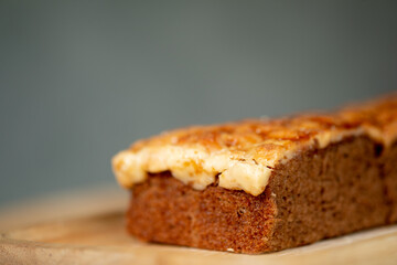 Toffee cake on a wooden plate