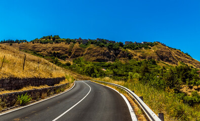 A panorama view towards the hilltop settlement of Polizzi Generosa in the Madonie Mountains, Sicily in summer