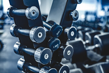 Fitness dumbbells in a gym