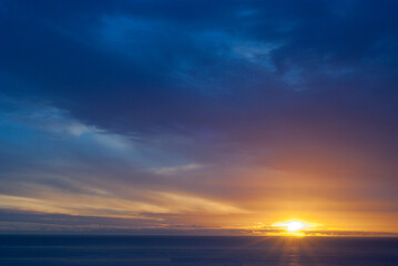 Naklejka na ściany i meble Beautiful sunset over the ocean in South Africa.