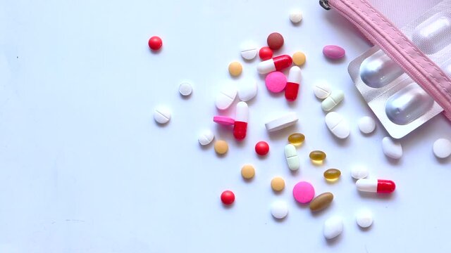 blister pac, colorful pills on white background 