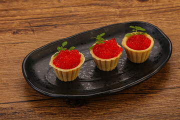 Apetizer - tartlet with red caviar