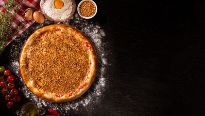 Garlic Pizza. Top view on black concrete background, close up. Traditional Brazilian Pizza