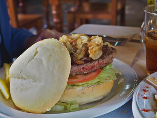 Large hamburger with village bread