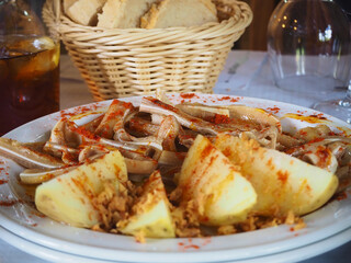 Paprika pork ears with roasted potatoes