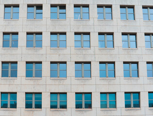 Obraz premium London streets business architecture. Cement office building with windows.