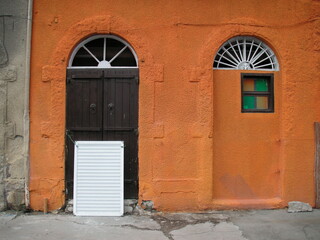 Fototapeta na wymiar Orange house front in Cyprus