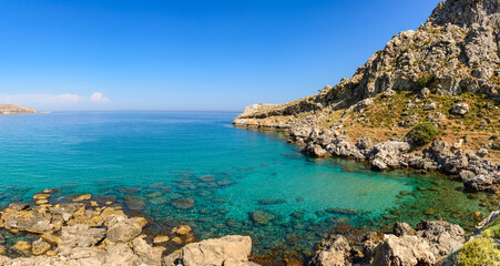Fototapeta na wymiar Agathi bay with crystal sea water, one of the best places on Rhodes island, Greece