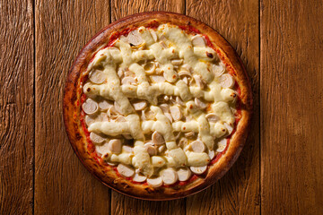 palm heart and cream cheese Pizza. Top view on wood background, close up. Traditional Brazilian Pizza