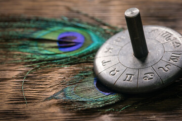 Horoscope zodiac wheel on the table close up.