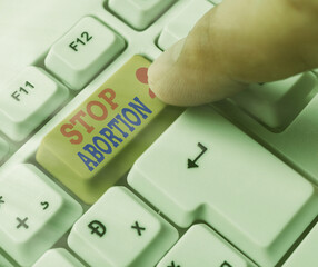 Handwriting text Stop Abortion. Conceptual photo advocating against the practice of abortion...